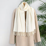 Women's plain pashmina in ivory on a camel coat 