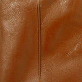 Women's touchscreen single-point faux fur lined leather gloves in cognac stitching